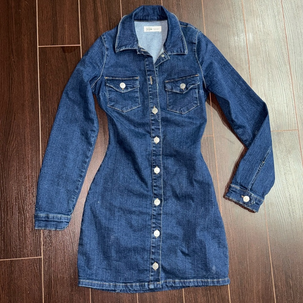 Denim button up mini dress in dark blue wash.
